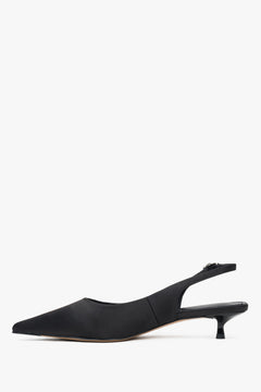 Comfortable black slingback women’s pumps by Estro, made from soft textiles and featuring a low heel.