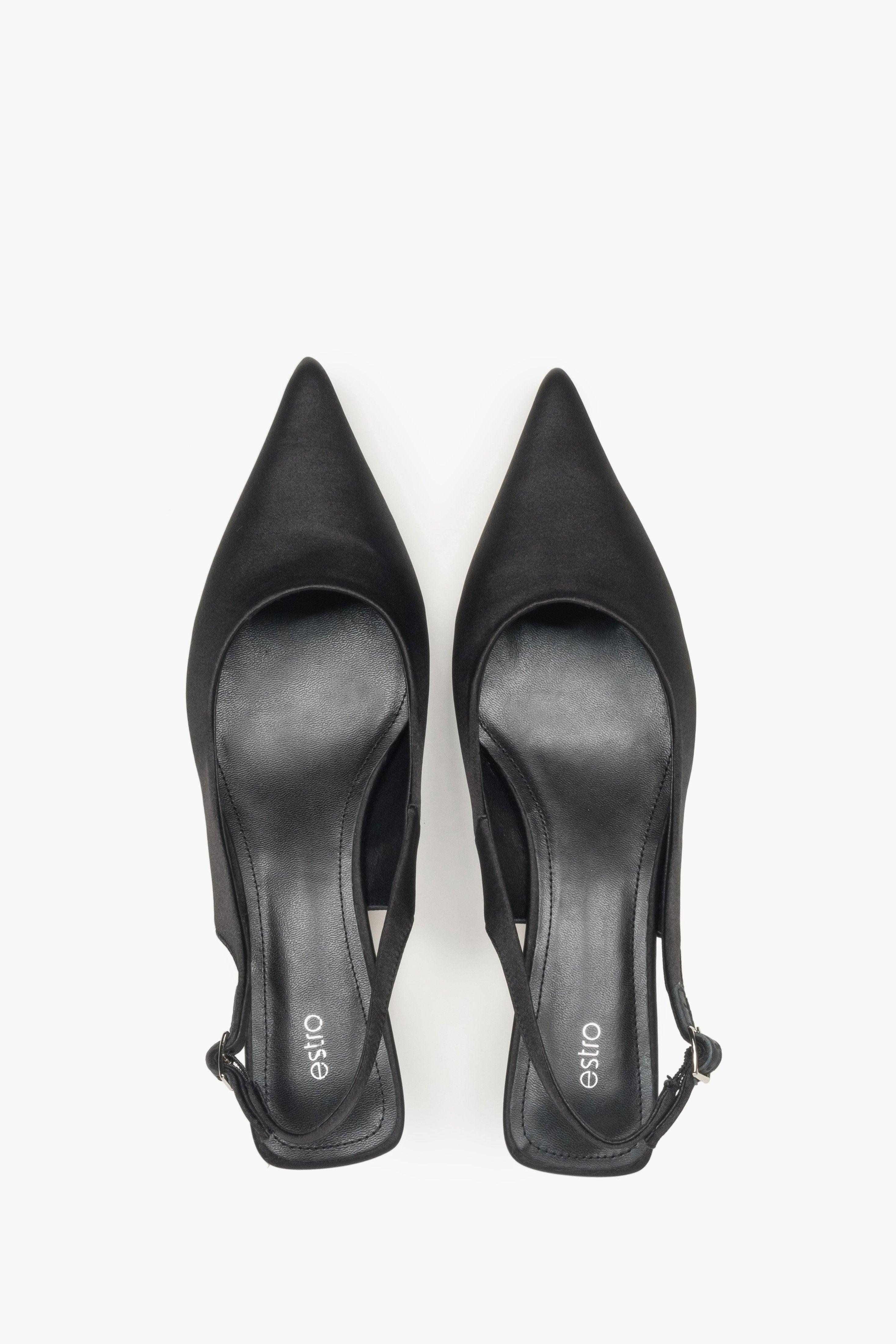 Timeless black slingback women’s pumps by Estro, crafted from soft textiles and set on a low heel.