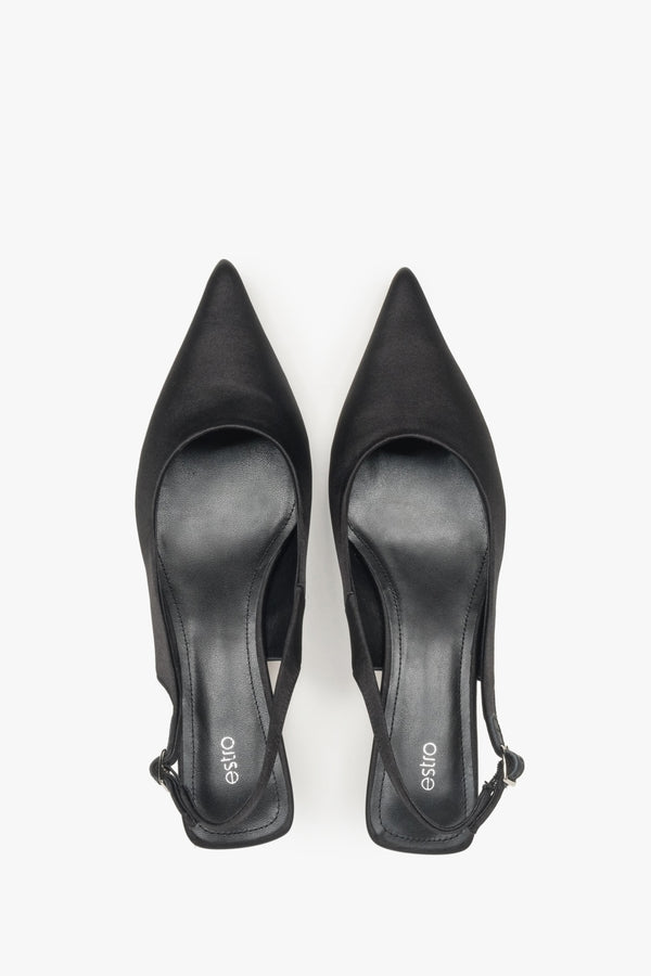 Timeless black slingback women’s pumps by Estro, crafted from soft textiles and set on a low heel.