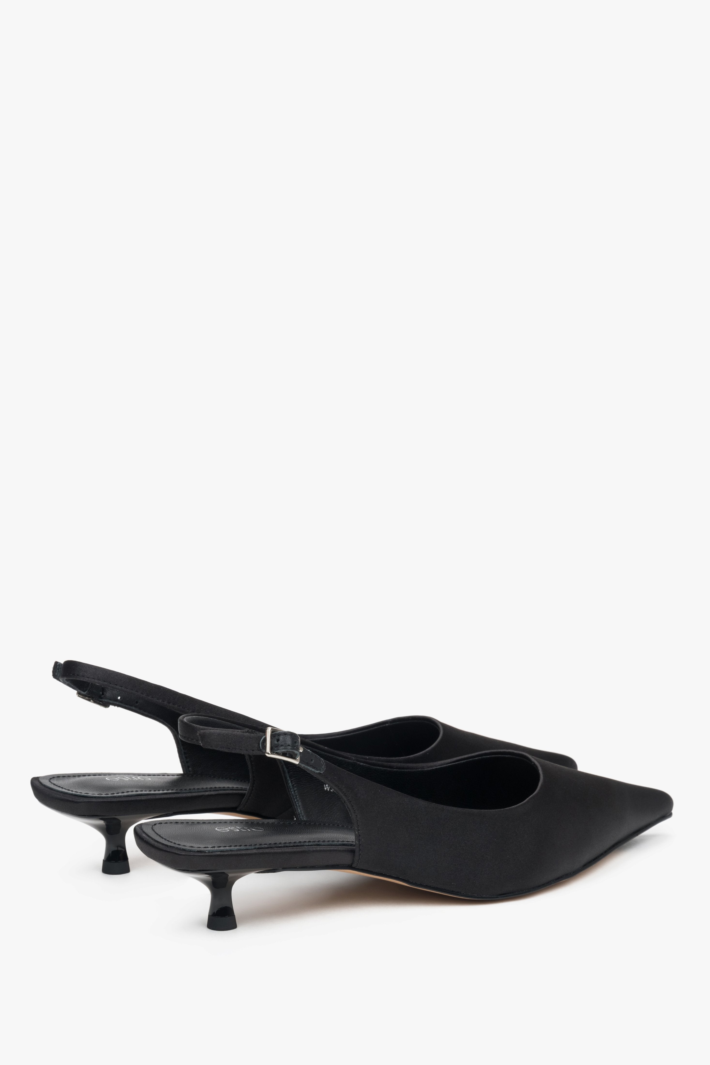 Black slingback women’s pumps with a low heel, made from soft textiles by Estro.