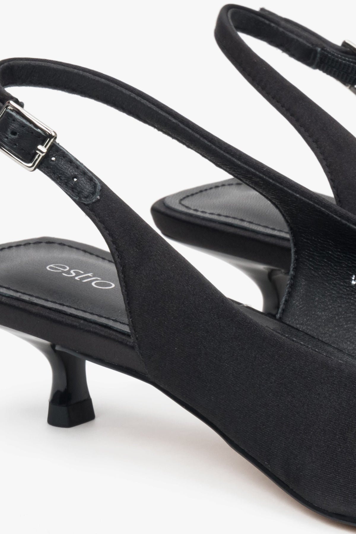 Black slingback women’s pumps with a low heel, made from soft textiles by Estro.