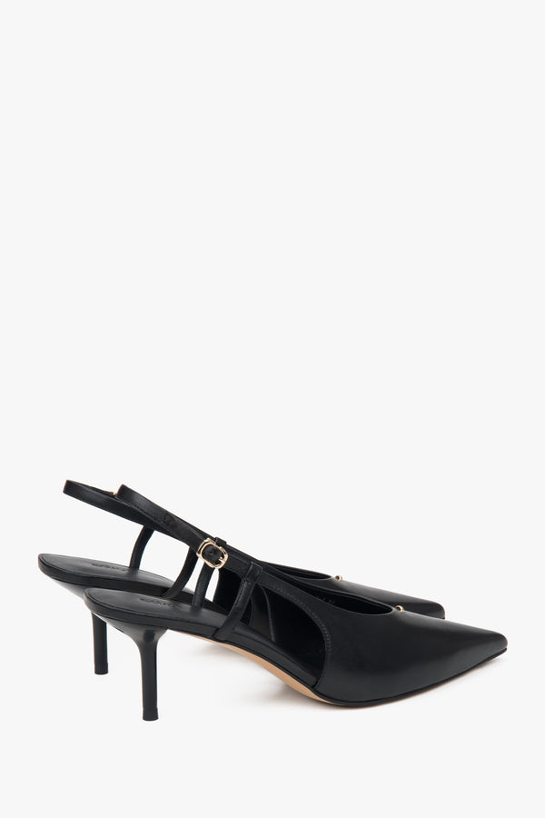 On a stable stiletto heel, black women’s slingback pumps with an open heel by Estro.