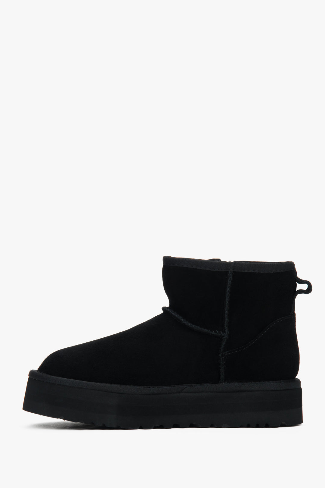 Warm and stylish women's snow boots made of black velour with a fur-lined interior.