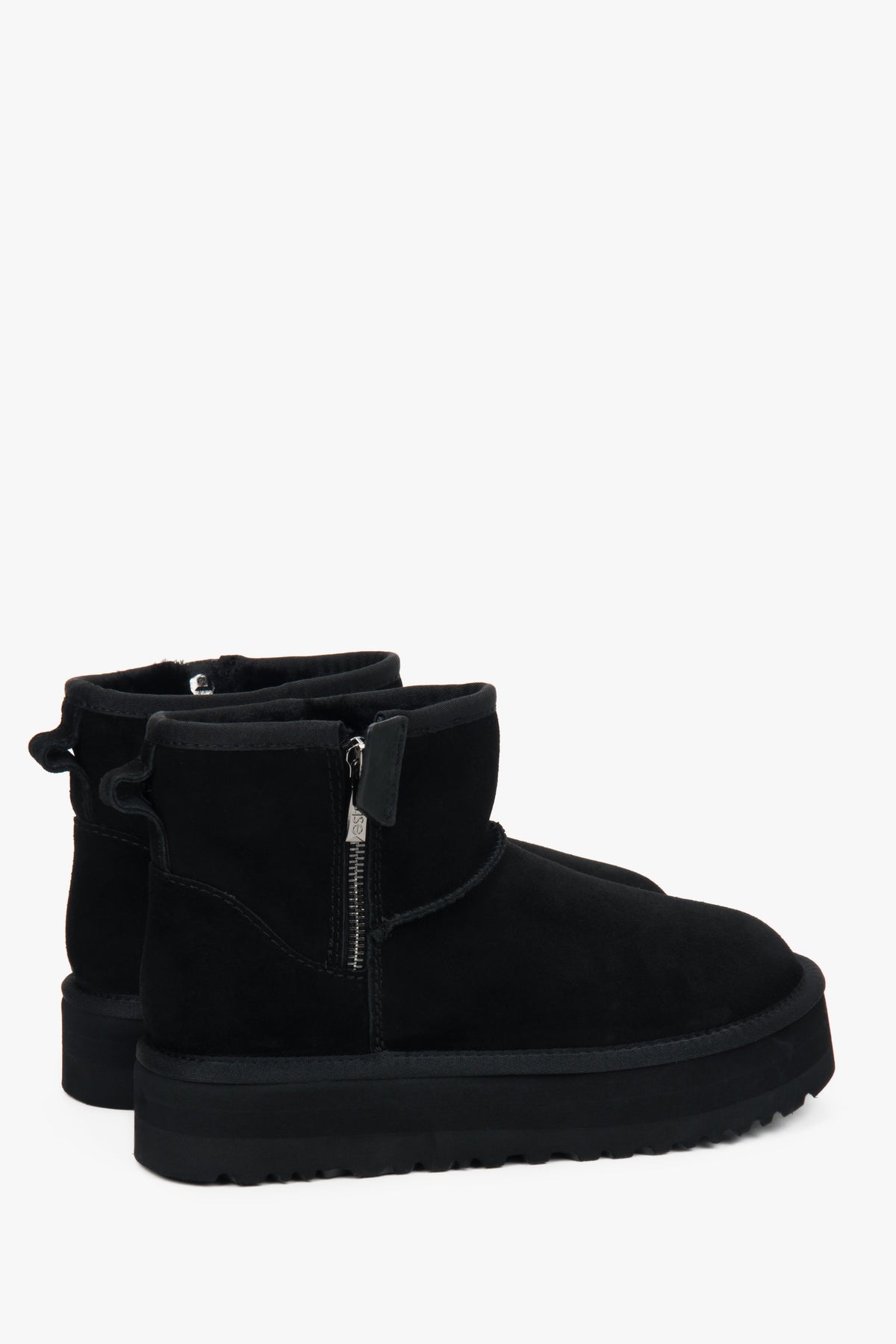 Black women's velour snow boots with fur.