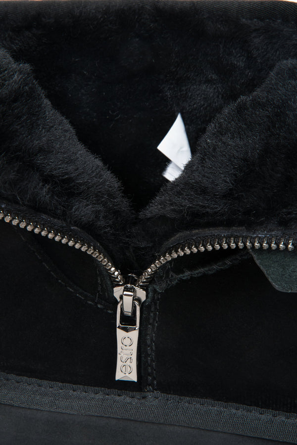 Elegant women's snow boots in black, made of genuine velour with a fur-lined interior.
