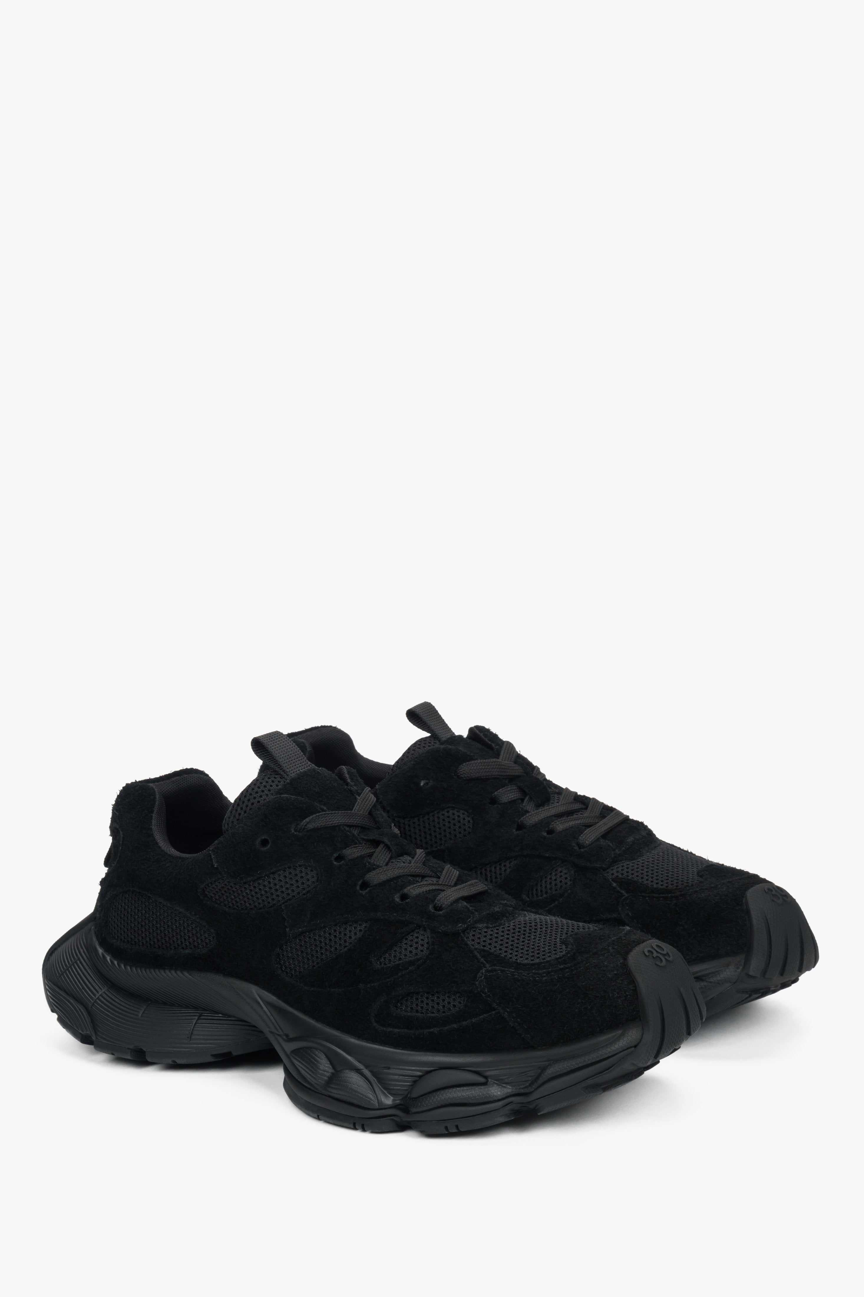 Black women's velour sneakers by Estro – a clean side profile showing the bold, geometric platform sole.