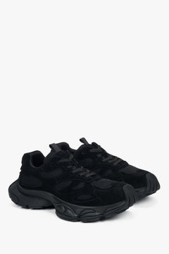 Black women's velour sneakers by Estro – a clean side profile showing the bold, geometric platform sole.