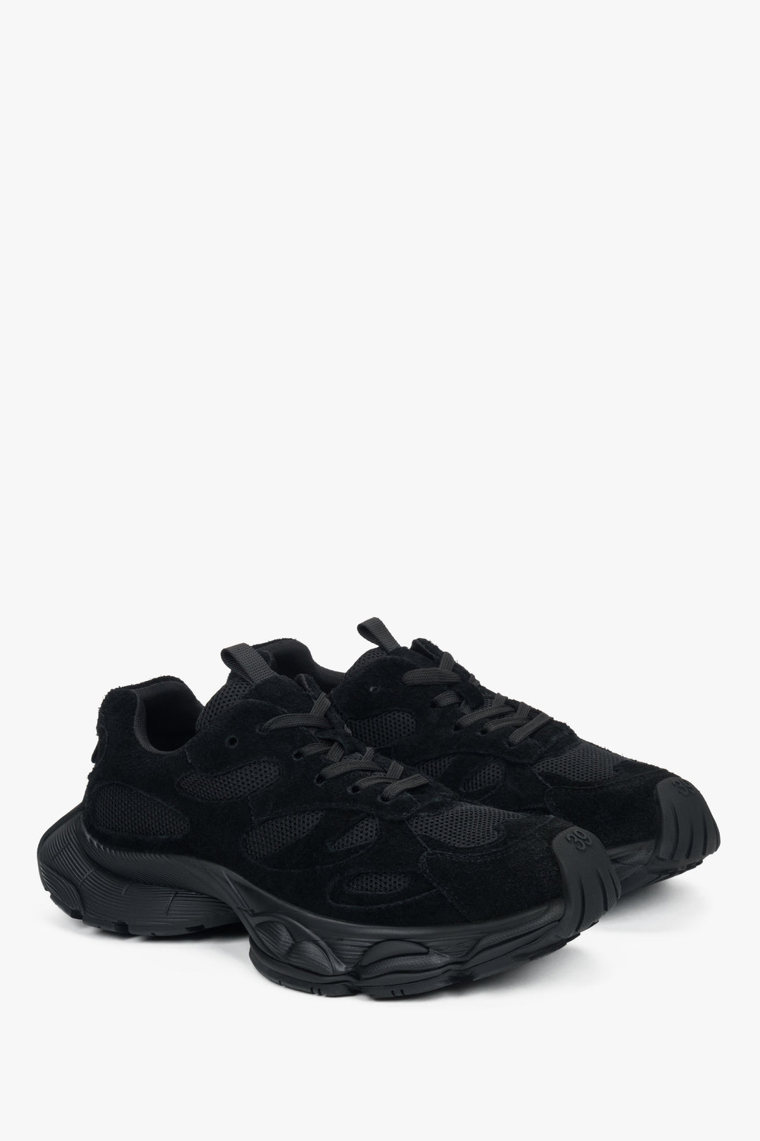 Black women's velour sneakers by Estro – a clean side profile showing the bold, geometric platform sole.