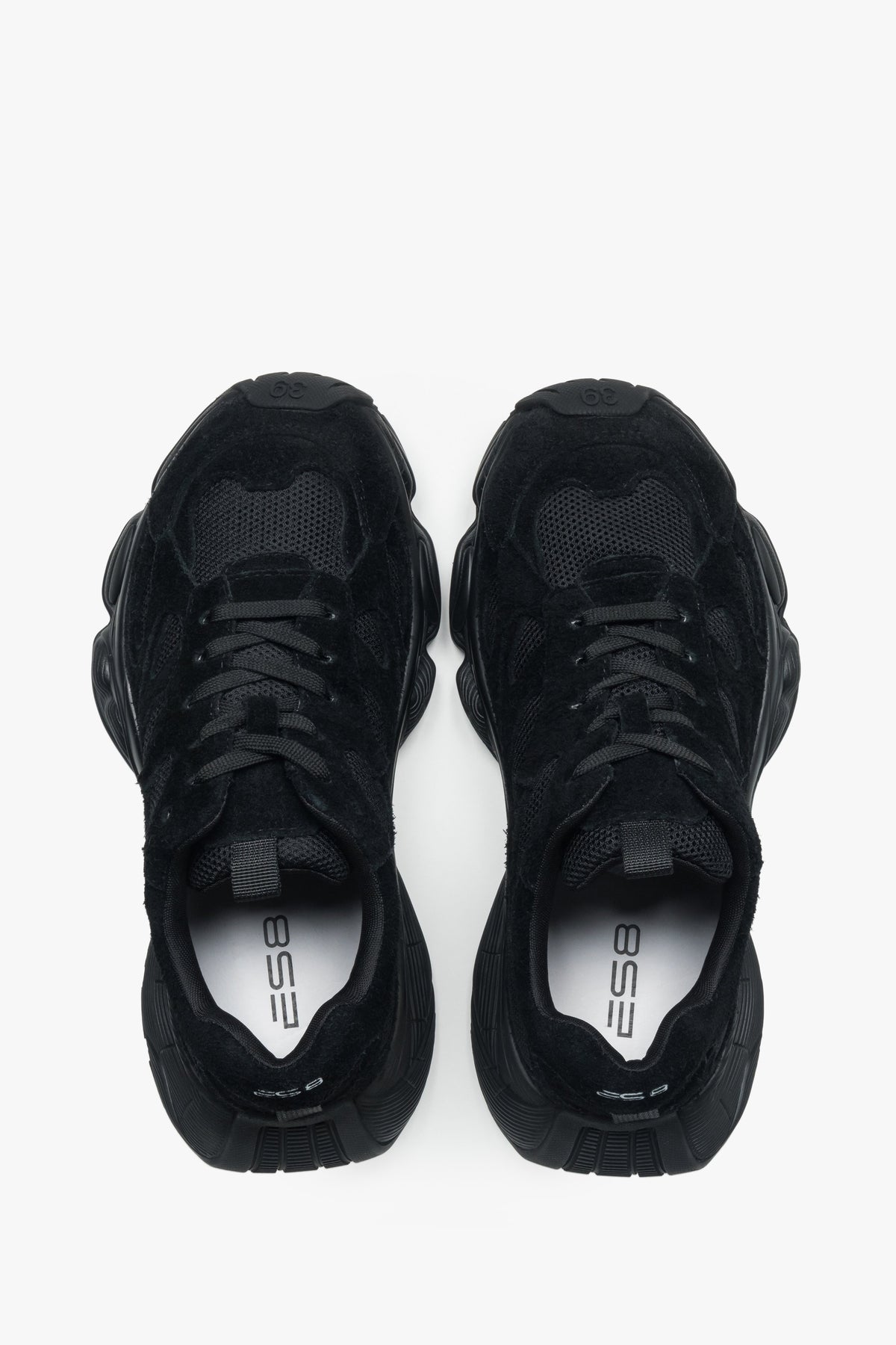 Women's black velour platform sneakers – back view highlighting the stable heel support and geometric sole structure.