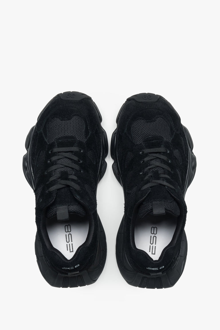 Women's black velour platform sneakers – back view highlighting the stable heel support and geometric sole structure.