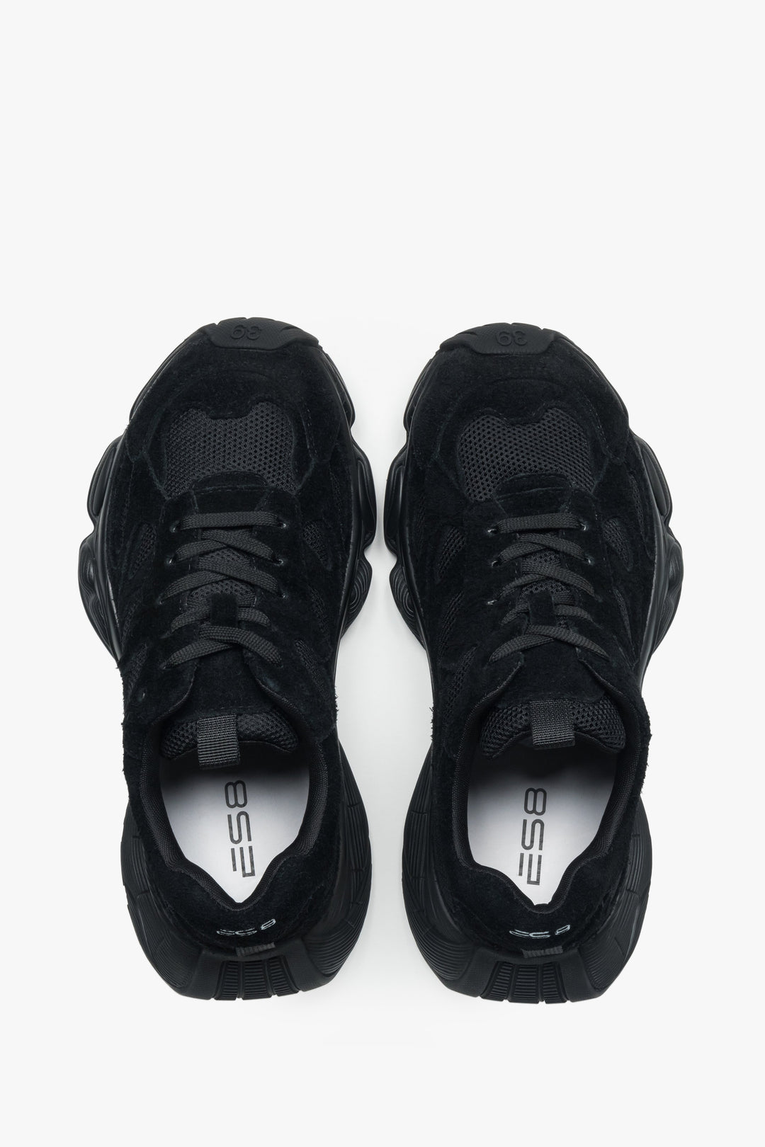 Women's black velour platform sneakers – back view highlighting the stable heel support and geometric sole structure.