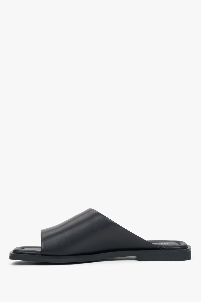 Comfortable flat sole and minimalist design for everyday wear.