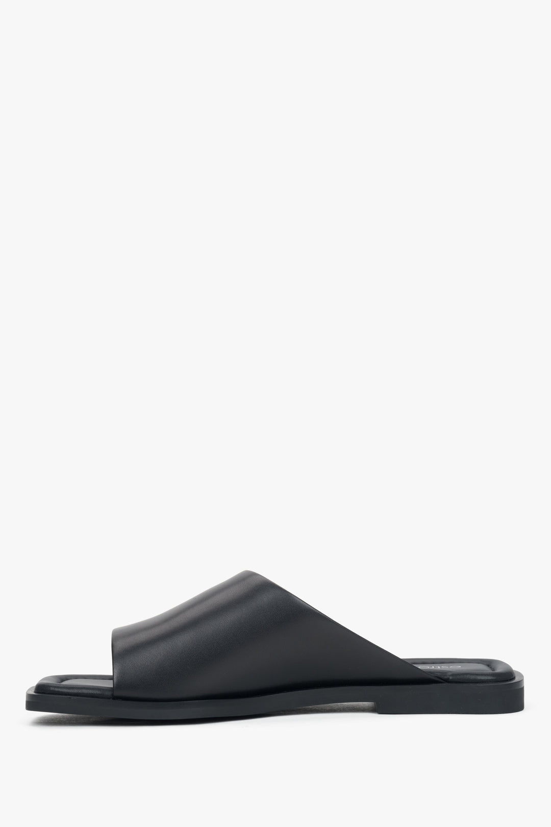 Comfortable flat sole and minimalist design for everyday wear.