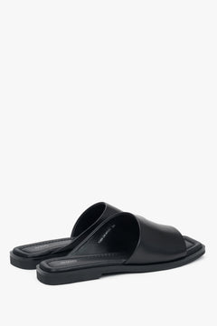 Black women’s slide sandals with a square toe in genuine leather, Estro.