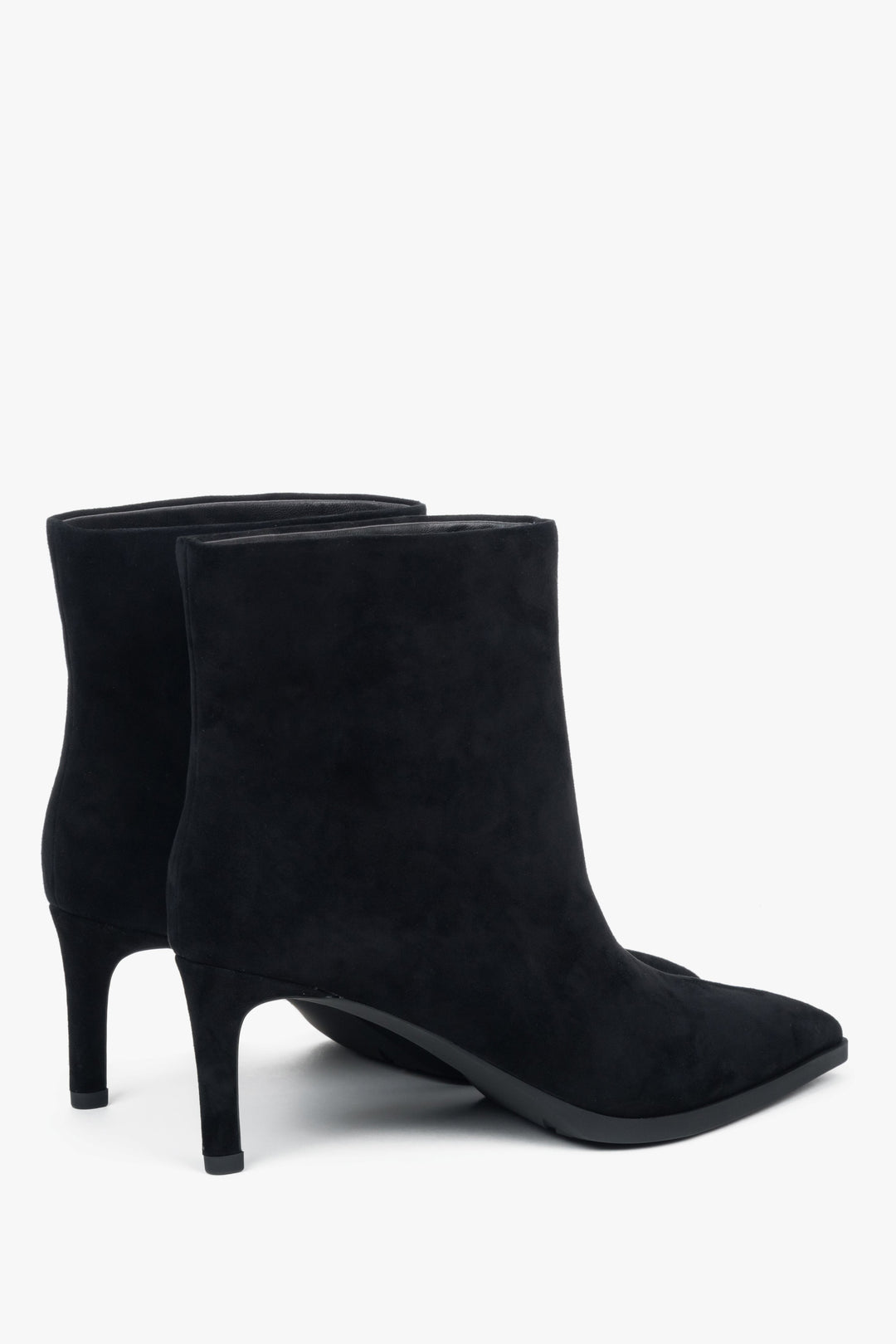 With a stiletto heel, short, black women’s ankle boots made of genuine velour Estro.