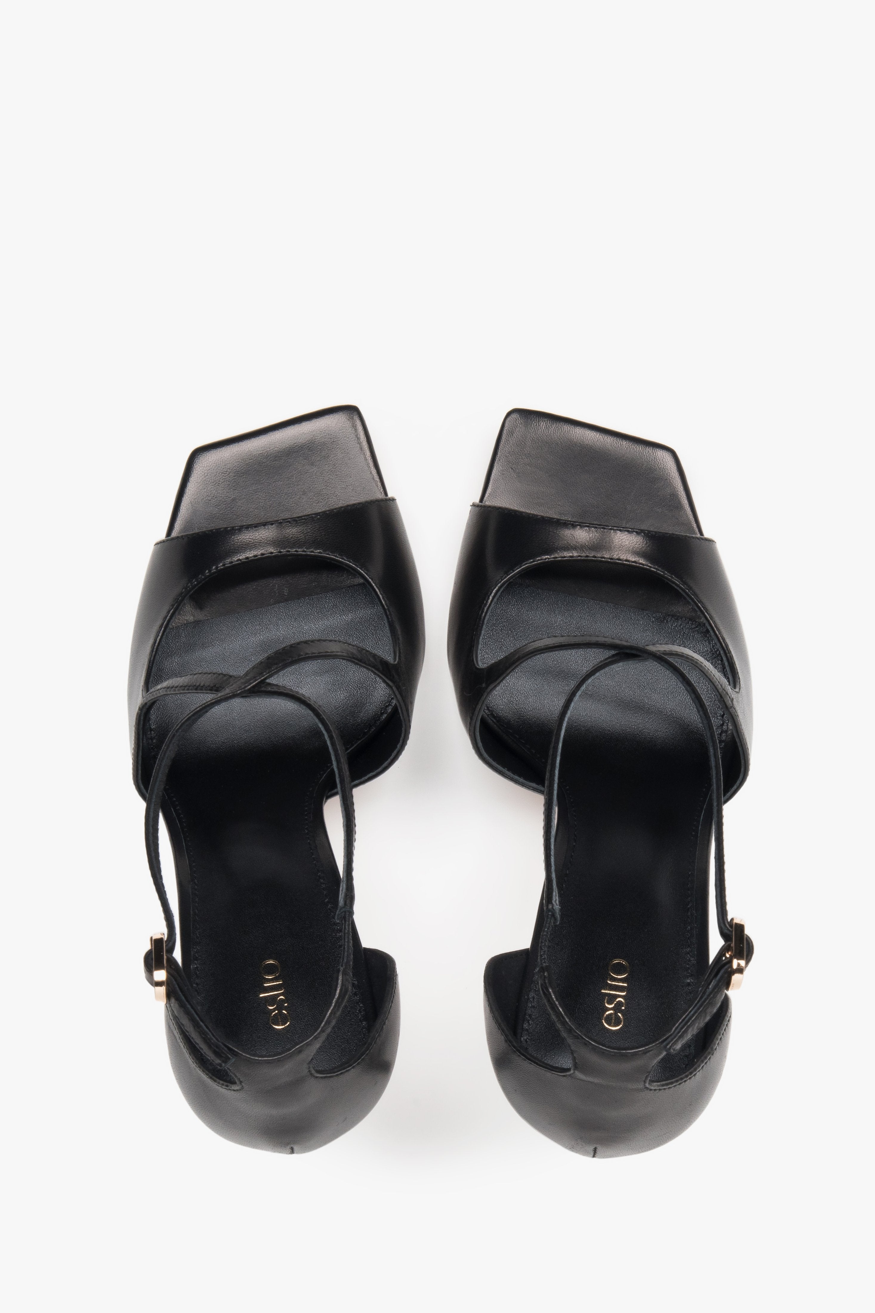 Women’s black stiletto sandals with decorative fastening by Estro – top view.