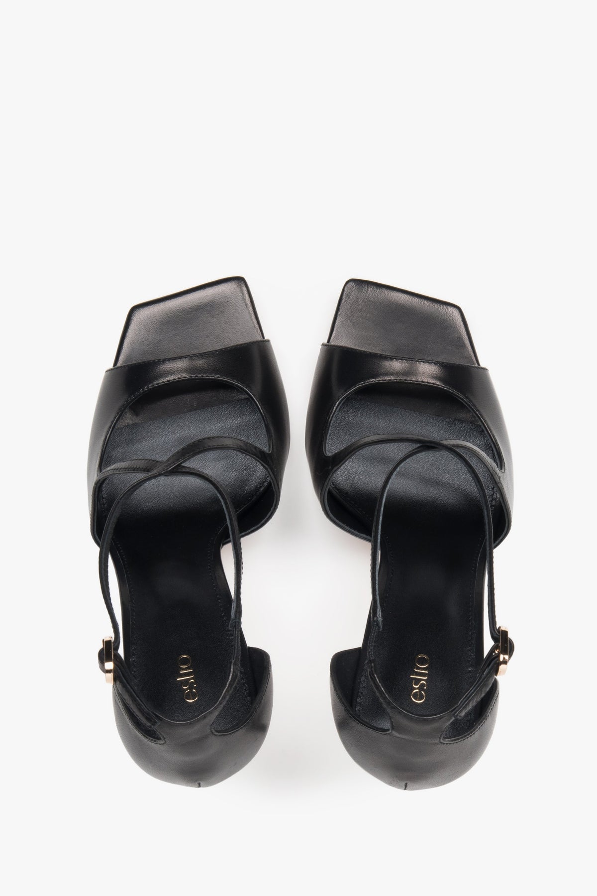 Women’s black stiletto sandals with decorative fastening by Estro – top view.