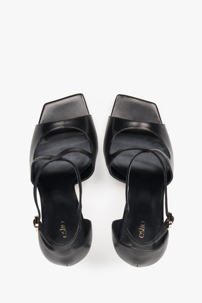 Women’s black stiletto sandals with decorative fastening by Estro – top view.