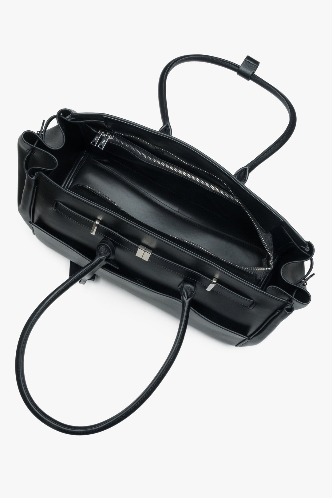 Spacious interior with three compartments, designed to fit A4 and keep essentials perfectly organized.