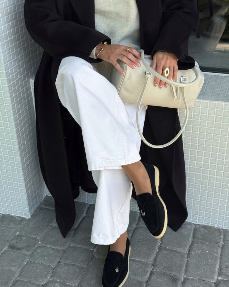 Estro black velour women's loafers - side profile of the shoe.