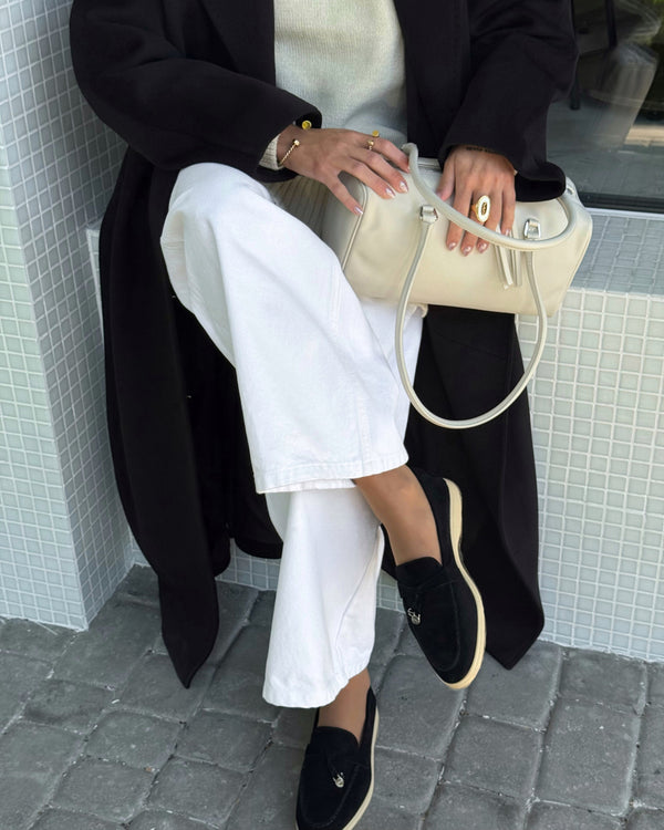 Estro black velour women's loafers - side profile of the shoe.