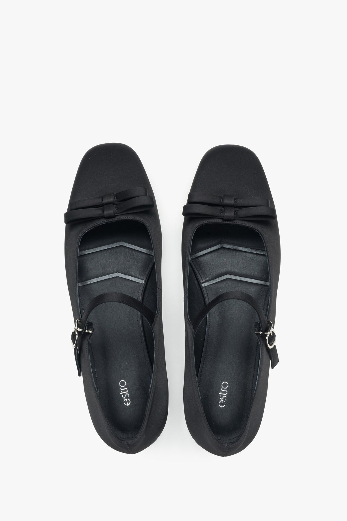 Estro black textile ballet flats featuring a buckle.