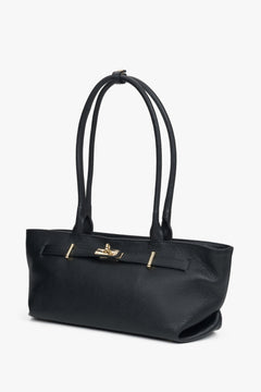 Elegant black tote handbag made of Italian premium genuine leather with long reinforced handles and gold-tone details – a stylish everyday companion.