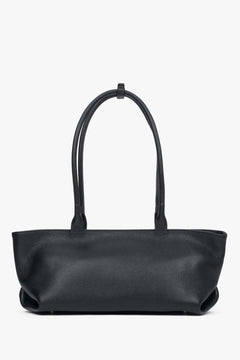 Women’s black leather shoulder bag with spacious interior, soft handles, and dual closure system for comfort and security.