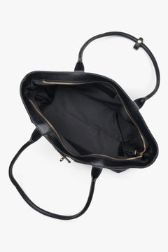 Classic tote handbag in black Italian premium leather, featuring refined gold hardware and a durable textile lining.