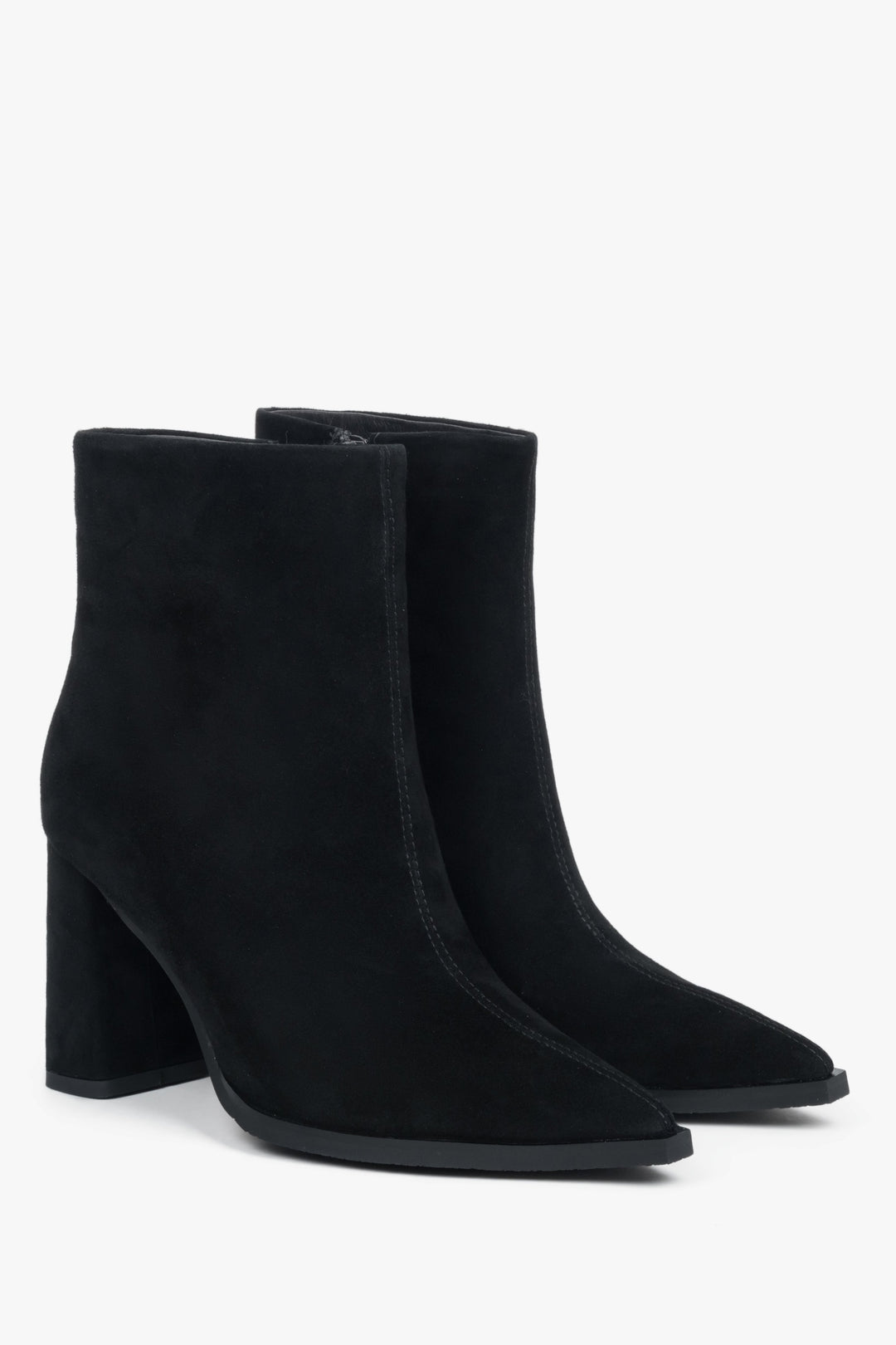 Black women’s ankle boots with block heel made of genuine velour.