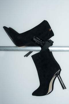 Black women’s high-heeled ankle boots in natural velour.