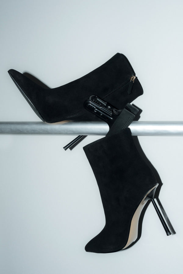 Black women’s high-heeled ankle boots in natural velour.