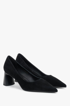 Black women’s shoes on a stable block heel made of natural velour with a pointed toe.