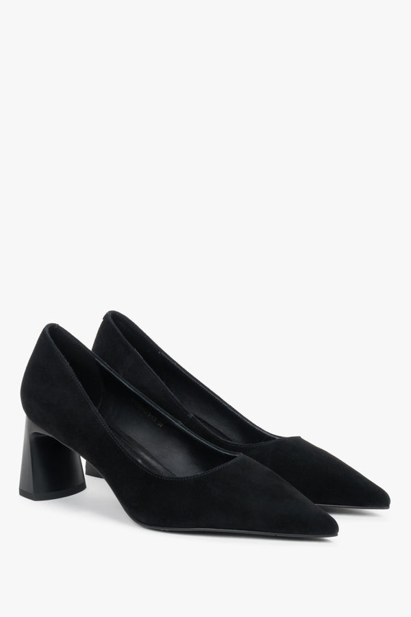 Black women’s shoes on a stable block heel made of natural velour with a pointed toe.