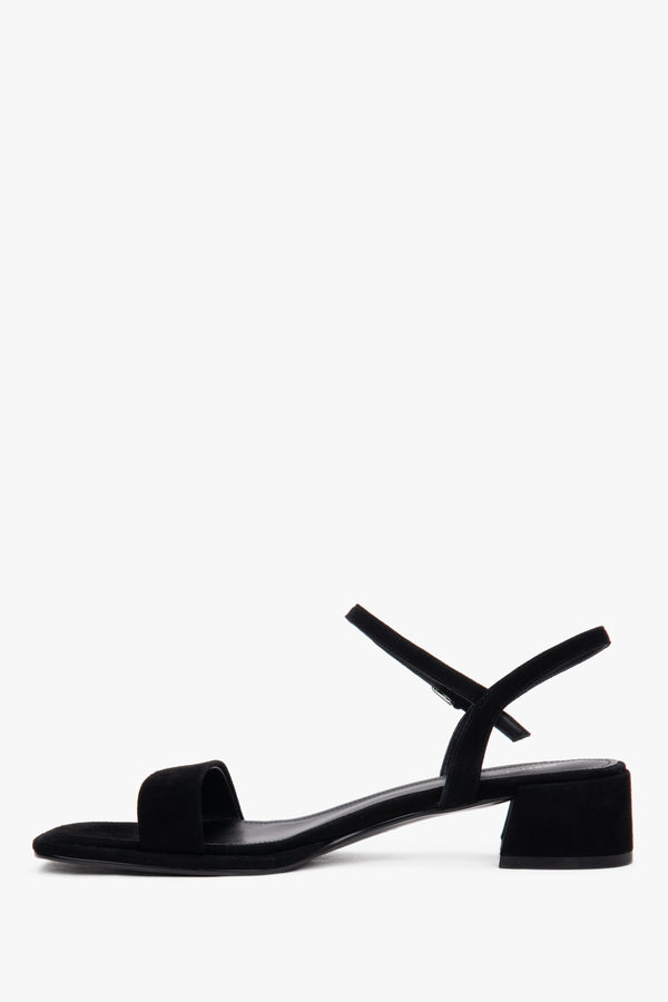 Elegant black suede sandals with a natural chevro kidskin leather interior.