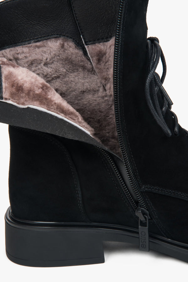 Model ER00118579 — women’s black winter ankle boots with fur lining and side zip.