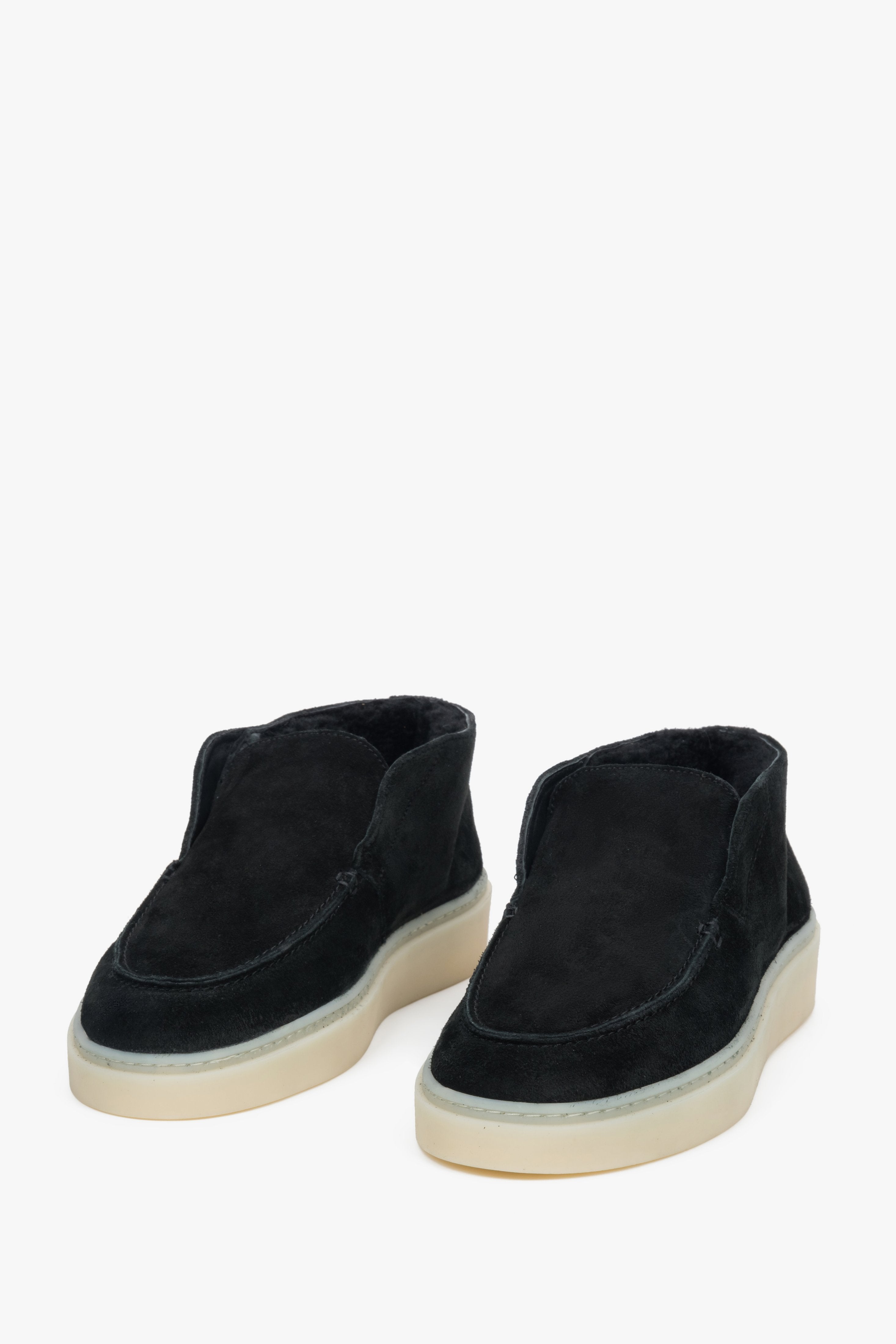Black velour loafers with visible soft fur lining inside and on the top edge of the upper.