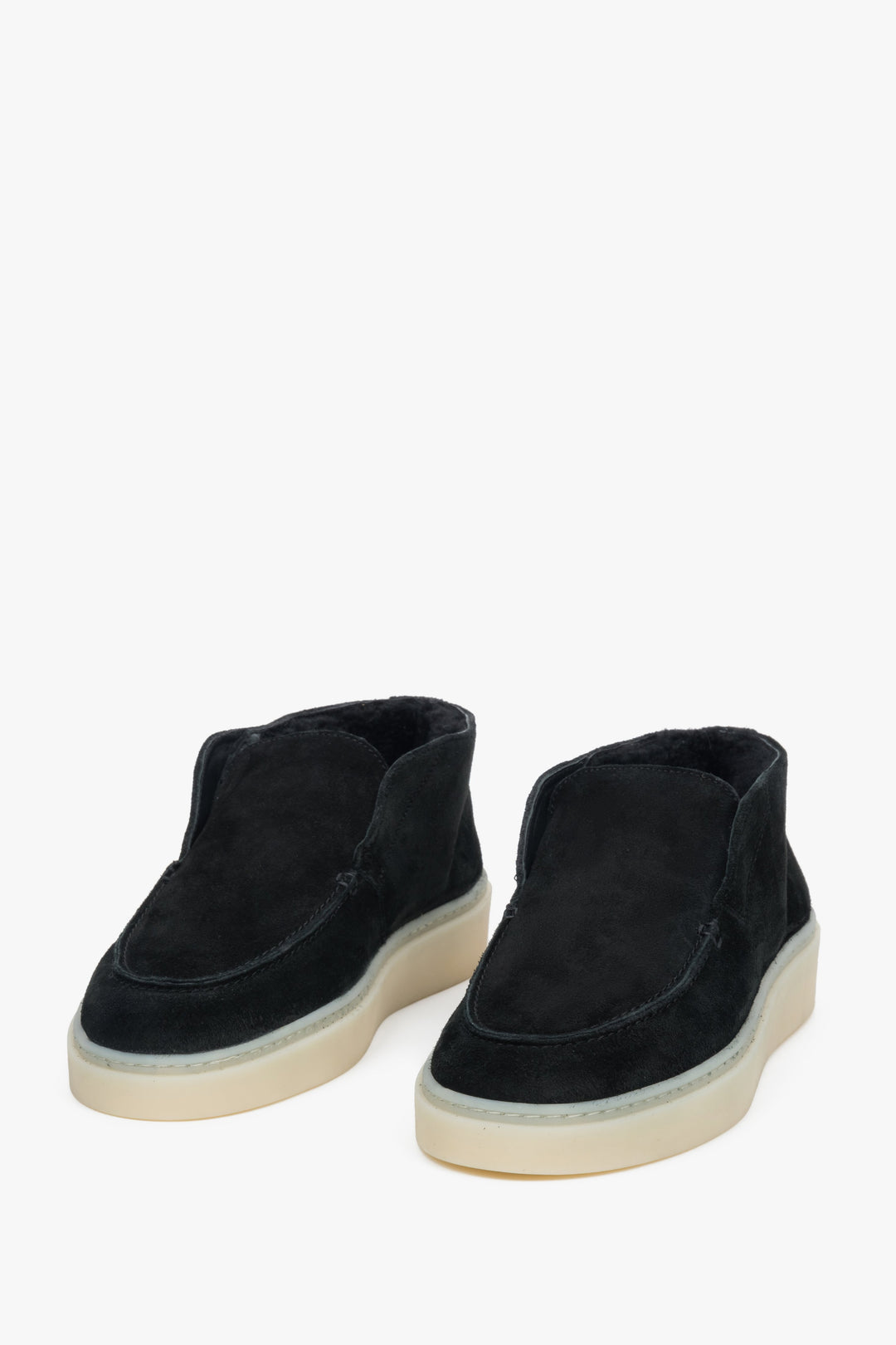 Black velour loafers with visible soft fur lining inside and on the top edge of the upper.
