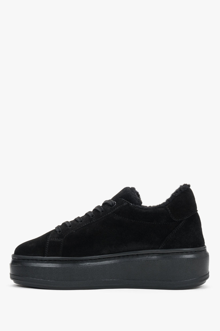 Close-up detail of the premium black Italian velour and plush fur accents.