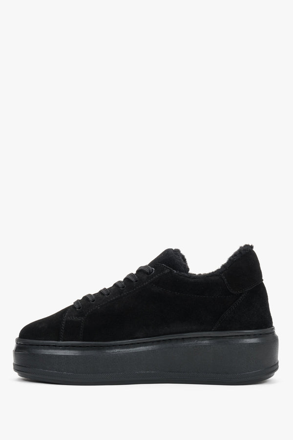 Close-up detail of the premium black Italian velour and plush fur accents.
