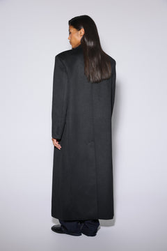 Women's black wool and cashmere coat Estro - back view highlighting the sleek fit and length.
