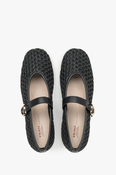 Black woven women's Mary Jane ballet flats with leather finishes and a gold buckle by Frau.