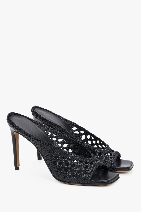 Elegant black handcrafted Italian leather slides with a square toe and intricate weave.