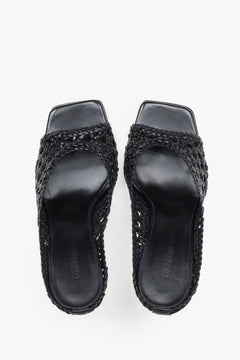 Guglielmo Rotta black high-heel mules featuring a premium woven leather strap.