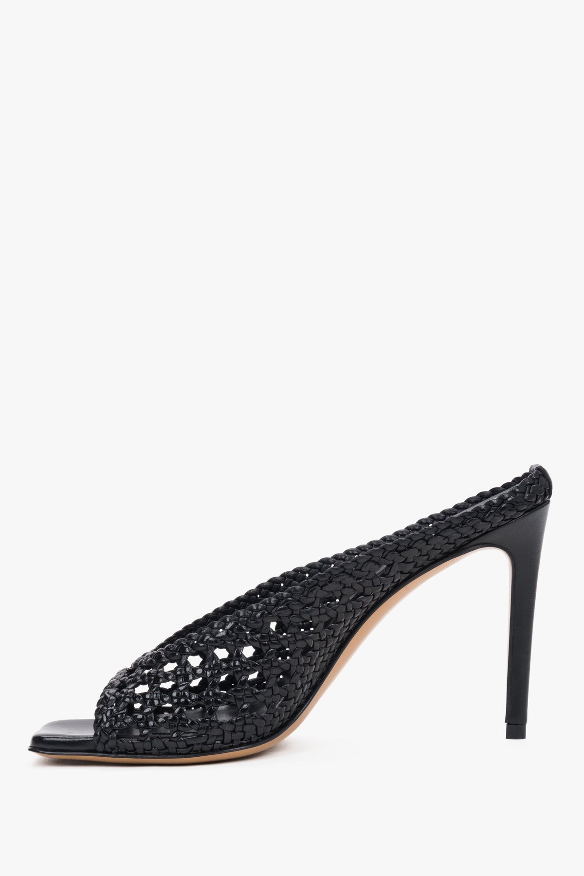 Sophisticated black leather stiletto mules, the perfect choice for high-fashion summer looks.