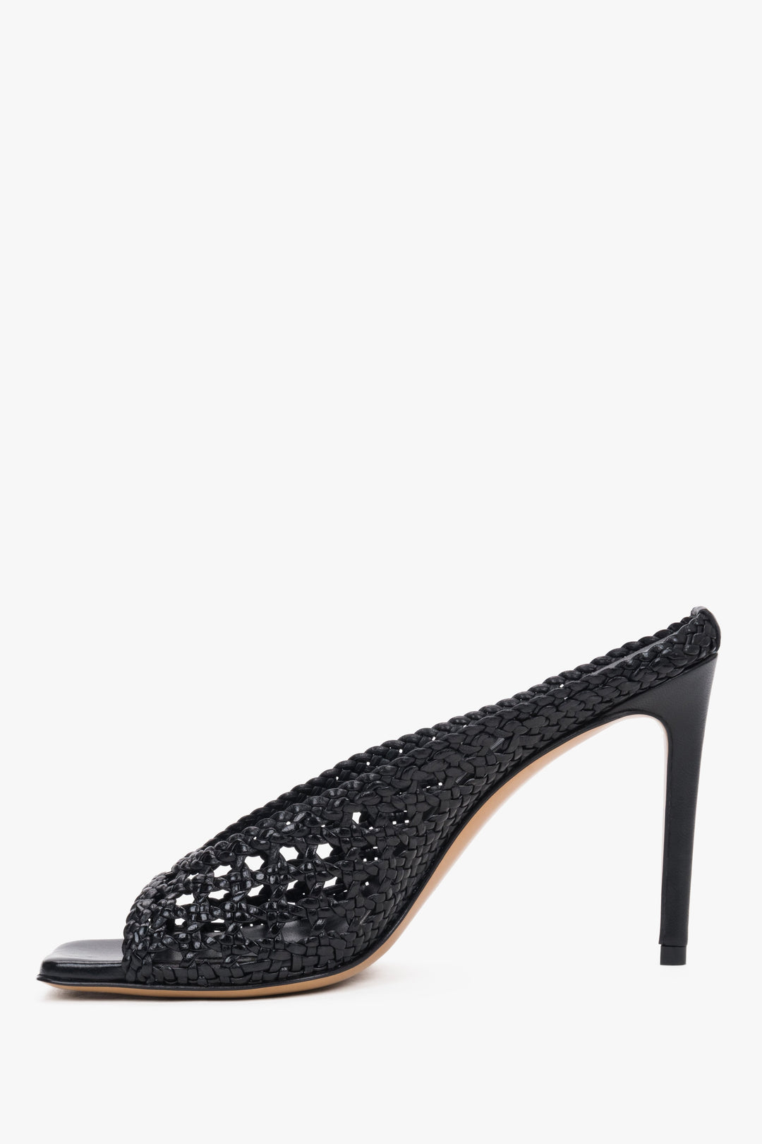 Sophisticated black leather stiletto mules, the perfect choice for high-fashion summer looks.