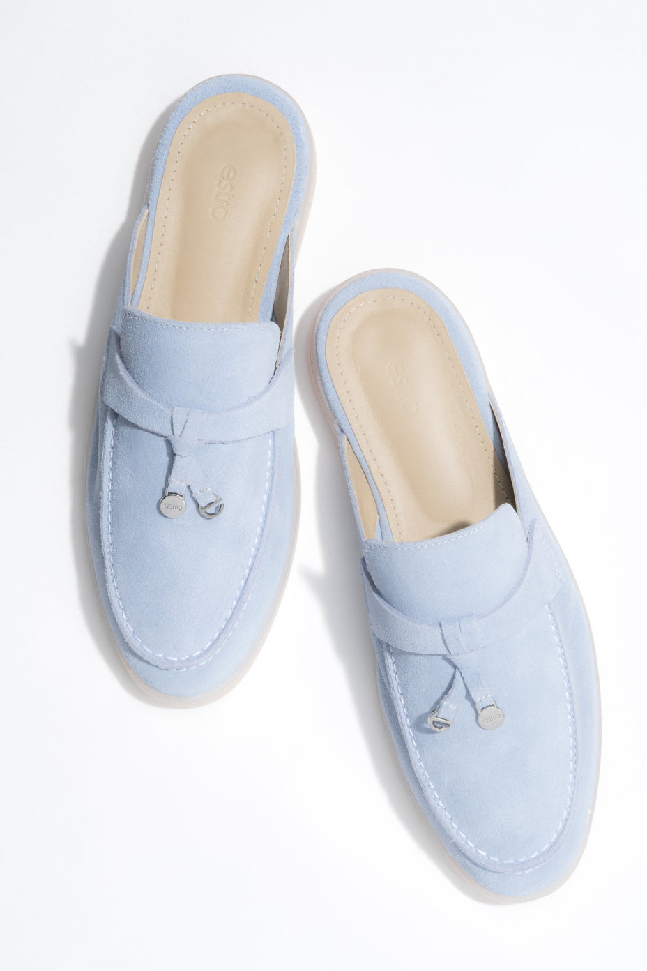 Light blue women’s mules made of soft Italian premium natural velour.