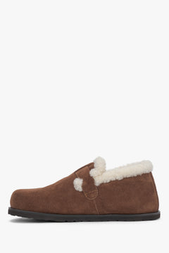 Women's brown suede loafers Estro - close-up view focusing on the decorative metallic buckle and soft fur interior.