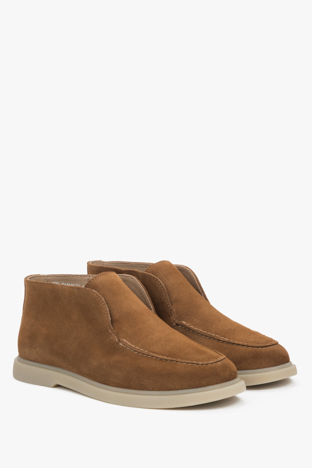 Brown slip-on women’s platform shoes by Estro.