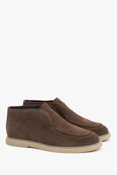 Brown slip-on women’s platform shoes by Estro.